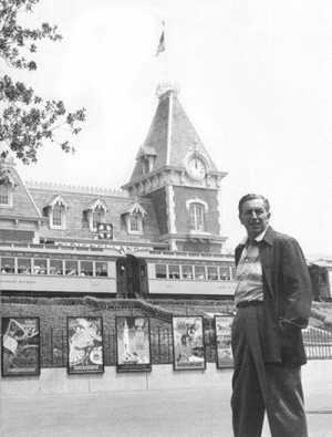 Walt Disney in front of Disneyland