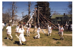 children dancing the May Pole
